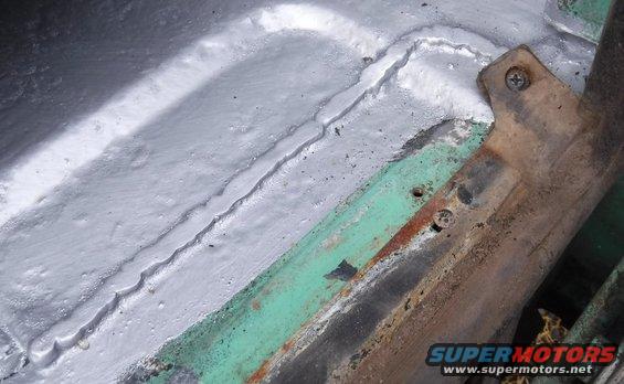 I need to shave the welds down a bit flatter for the tailgate weatherstrip to screw down flush.  I also forgot to put in the thin metal strip below it.