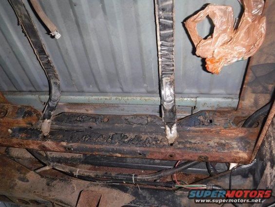 Opposite view of the fuel tank area after cleaning.  Definitely some surface rust there, but nothing disturbing that I can spot.  I emptied nearly a full can of Rust Reformer on it.