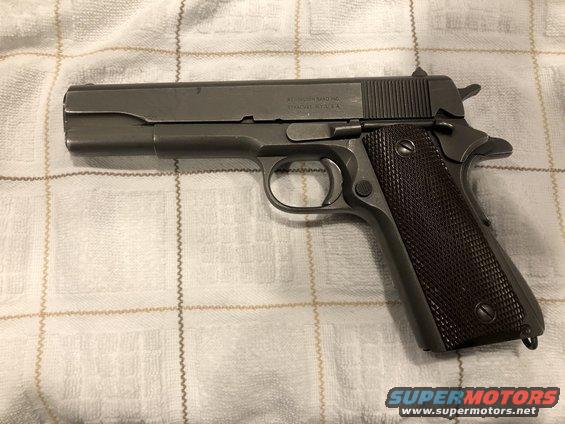 Colt M1911 pistol with textured grip