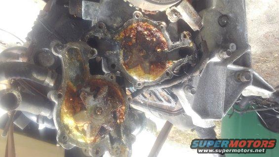 kimg0483.jpg along with the oil being pudding, the coolant in the engine had turned to solid crystal, seizing the water pump. another reason this is to be a temporary engine

in any case i did get the engine in. flushed the oil and coolant a few times. i left the original heads and cam in te engine because i feared that if the engine were to give out it would damage both.