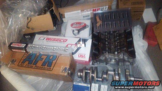 2.jpg pretty much everything for building a longblock 410ci stroker. Stroker kit is from FordStrokers.com and the top end is from FlowTechinduction

F4TE 351w engine block bored .040 over
RPM 4.000&quot; stroke internal balance crankshaft
SCAT 6.2&quot; H beam rods
Wiseco forged  22cc dish pistons
Clevite HX bearings
AFR 205 cylinder heads
Custom billet FTI camshaft hydraulic roller
Morel hydraulic roller linkbar lifters