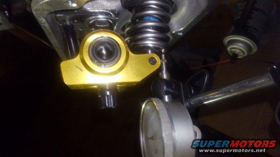 15.jpg using the Mid-Lift technique for rocker arm geometry.

most rocker arms have you just have the roller tip center in the valvetip to acquire geometry.

the MidLift technique has you measure the pushrod length when you are at 50% cam lift. when at 50% lift you want the top of the rocker arm to be 90* from the rocker arm stud. the purpose of this is to make sure the sweep of the rocker arm is consistent and to spec and even loaded.