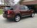 2016 Ford Explorer - This 2016 Ford Explorer is parked in a driveway, showing its rear and side profile.