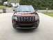 2016 Ford Explorer - The front grille and Ford badge are clearly visible on this maroon SUV.