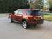 2016 Ford Explorer - This 2016 Ford Explorer is shown in a rear three-quarter view, parked on a concrete driveway.