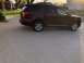 2016 Ford Explorer - Maroon 2016 Ford Explorer parked on a driveway in front of a house.