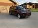2016 Ford Explorer - This maroon 2016 Ford Explorer is parked in a suburban driveway in front of a brick house.