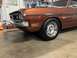 1971 Dodge Dart - Front quarter view of a brown 1971 Dodge Dart, a black side stripe and 'Dart 340' badging.