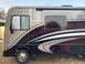 2015 Ford F-550 - This motorhome features a side view with distinctive graphics and Fleetwood badging, but its year is not discernible from the image.