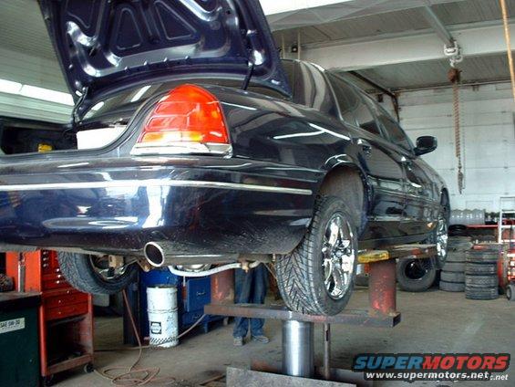 Getting the new wheels & tires on. Spring 2003.