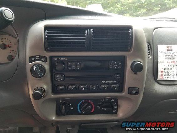 20200613_155803.jpg The center registers were broken, so after MUCH searching, a new Ford bezel (5L5Z-1004302-GAB) was installed. Later, the cigar lighter was swapped to a dual-USB voltmeter.