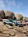 1973 Ford Bronco - A collection of Ford Broncos gathered at Katemcy Rocks in April 2004.