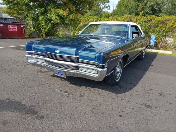 front view showing where I touched up the lower grille hiding the vertical bars. Although with the sun shining directly into the grille, it is not as apparent.