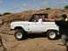 1973 Ford Bronco - A white 1973 Ford Bronco navigates a rocky terrain during the Katemcy Rocks Bronco Roundup.