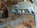 1967 Ford Mustang - The interior of a 1967 Ford Mustang shows significant rust and is stripped down for restoration.