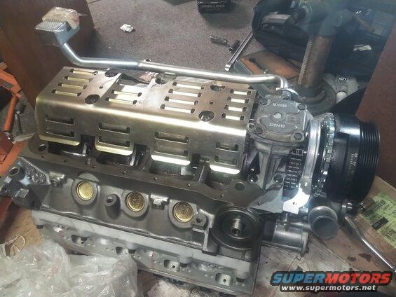 kimg01481.jpg Main studs. Windage tray

M10688 performance HV oil pump. Pickup tube measured for pan depth

Explorer 5.0 harmonic balancer rebalanced for 28oz. Explorer timing cover and water pump