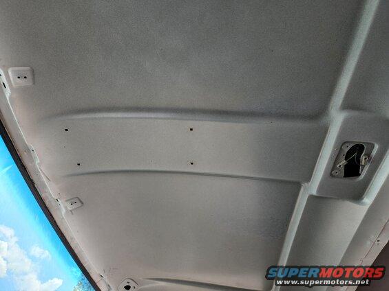 ohcholes.jpg This '95 Bronco XLT was built without the overhead console, but it still has the mounting holes in the roof, so I assume all '94-96 Broncos do.
IF THE IMAGE IS TOO SMALL, click it.