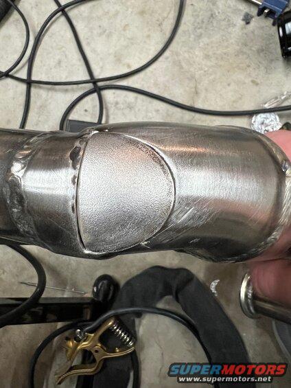 I cut out a spot where the weld blew through and put a patch on it. For whatever reason the Sch 10 wasn't exactly Sch 10 in that spot. Should be around 0.1" and was maybe 16-gauge. 