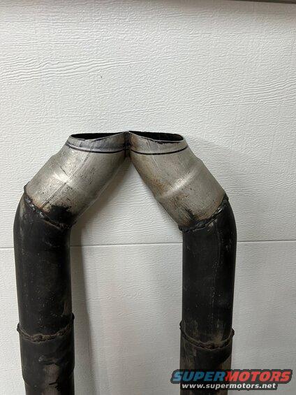 15-x-pipe-cut-for-merge.jpg Cut the X off where it would just overlap the new merge. I didn't leave enough meat in that weld to keep the rest of the pipe from bending. So I'll need to put it back in the car and weld a brace temporarily. 