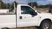 2008 Ford F-250 - A white 2008 Ford F-250 pickup truck is shown from the front three-quarter angle.