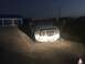 2008 Ford F-250 - Front view of a 2008 Ford F-250 pickup truck parked at night, its headlights are on.