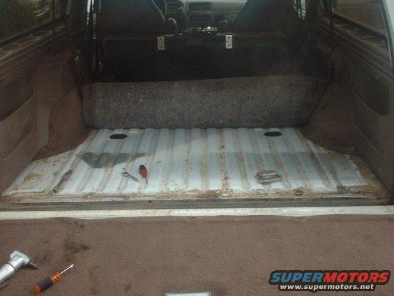 tank1.jpg Before Shot.. Raised the carpet (later i cut it out..)