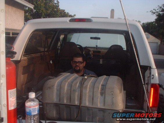 tank3.jpg Test fit the tank to see what you need to trim. I had to remove about 1/4" from the lip of the rear brace. .