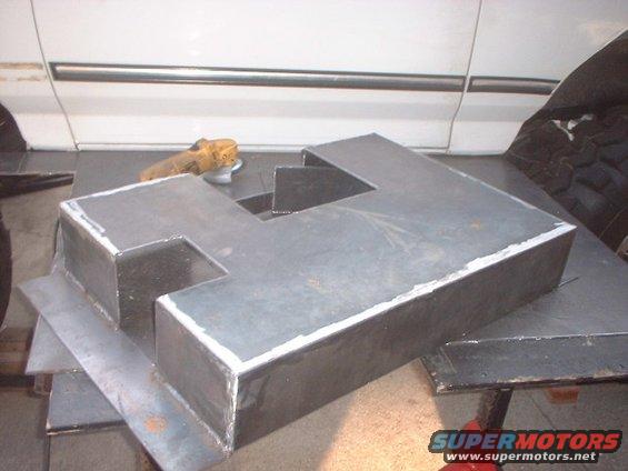 tank8.jpg Has 2 access areas.. One for the the fuel hose and one for the fuel pump. 