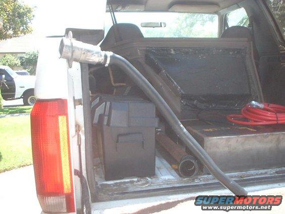 tank16.jpg It came up that the California Smog places would check for proper fuel filler so i decided to use the old one. I cut the metal outer hose since it wasnt at the right angle. 