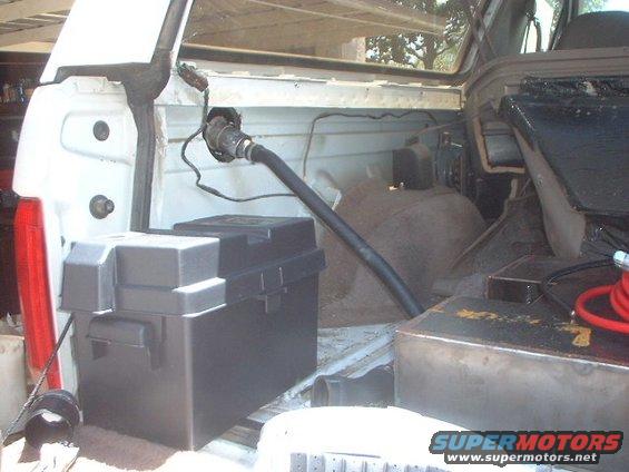 tank18.jpg view from the back. The fuel goes through the black hose into the tank and the air and fumes escape through the outer tube (missing).