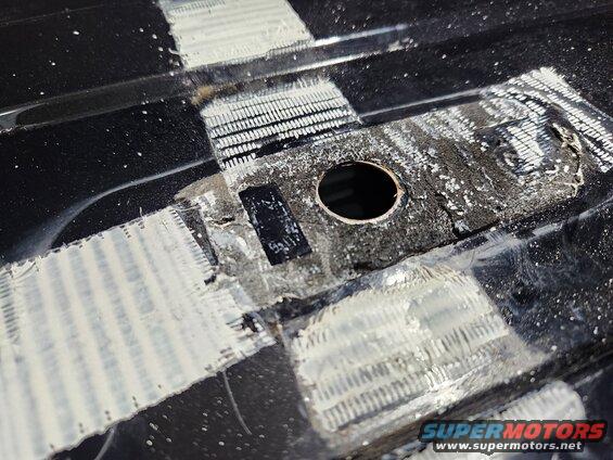 roofholes14.jpg The tape was applied over the remains of a self-adhesive foam gasket.