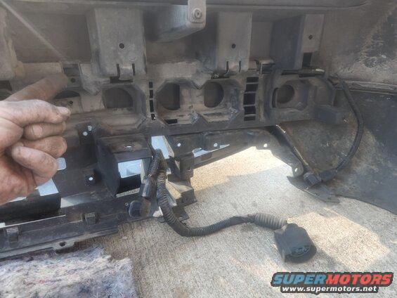 recvr15f.jpg With some effort, the harness can be threaded between the absorber & cover. This one also has parking sensors & a RKE antenna, but not a liftgate sensor.