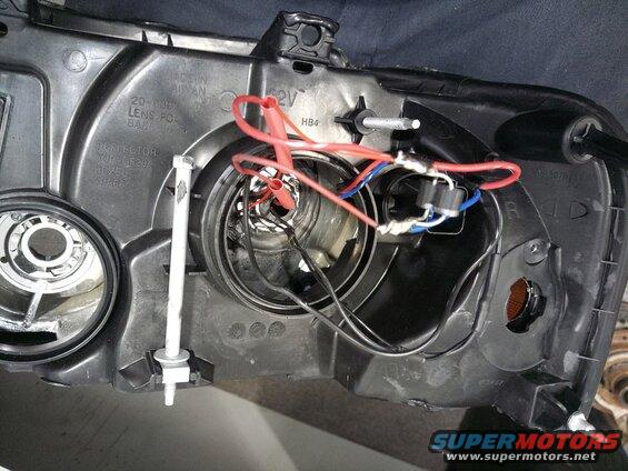 kimg1076.jpg Because the Expedition has a separate highbeam and lowbeam bulb but the projector uses one bulb for both with a shutter for highbeam. This makes an issue that lowbeam would work fine but highbeam would not. 

You would either have an issue that highbeam would activate the shutter but not the bulb. Or the highbeam would activate both, but so would low beam. Or you ignore the shutter and use the separate high beam bulb.

I used a 15SQ045 diode that i found a 20 pack on Amazon for $6. They should be rated for 15 amps each but i doubled the diodes to try and help . Not sure it was the correct thing to do but its what i did.

A simple fix would be to use a diode on the highbeam so it allows power to go to both the shuitter and the bulb, but prevents the low beam from activating the shutter

They also do sell 'bi-xenon' relay kits to do this but a diode will work just fine if you understand how to use them.

Not only did i do the diode, but i wired the separate highbeam bulb so not the projector and the high beam bulb will be activated for max brightness.