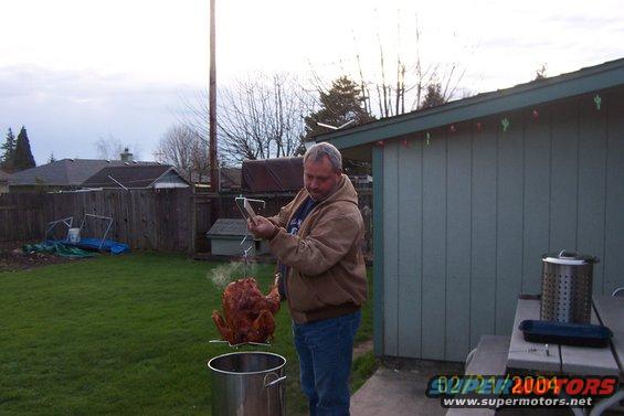 dinner.jpg my dad cooking dinner.. YUM...