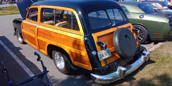 img_20250928_133319560.jpg This woody pulled up next to me after a PT Cruiser left.  It was a '50 Ford Woody, for sale @ $65k