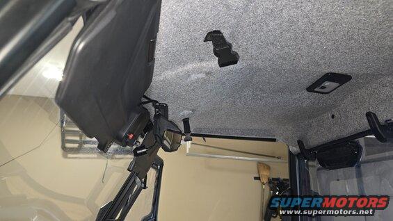 Interior view of a vehicle's sun visor and headliner