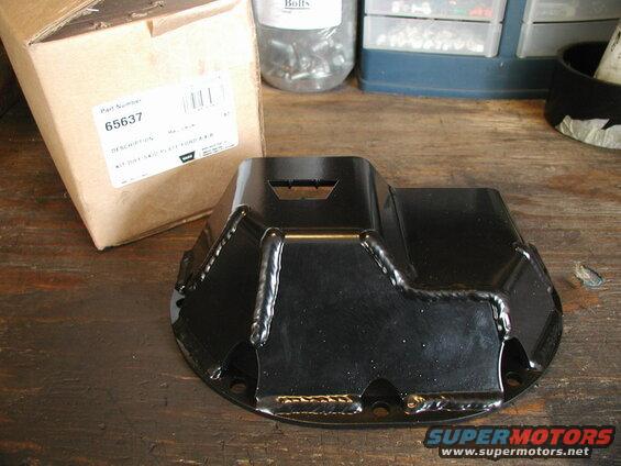 Black metal differential skid plate and its packaging.