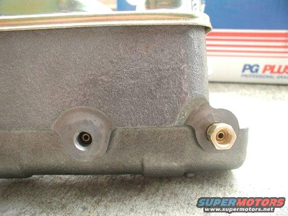 Gray brake master cylinder with brass fittings and PG PLUS box in background
