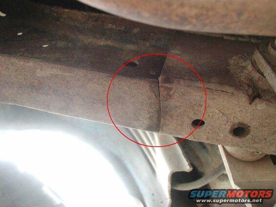 One big crack in front of the shackle mount.