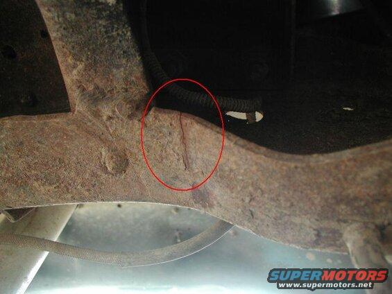 One crack behind the crossmember.