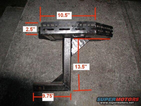 Black metal hitch-mounted cargo carrier with dimensions marked: 10.5", 2.5", 13.5", and 9.75".