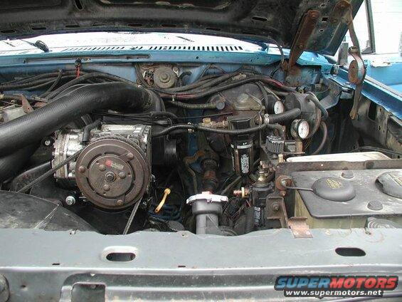 Here are a few pictures of how the system looks under-hood: