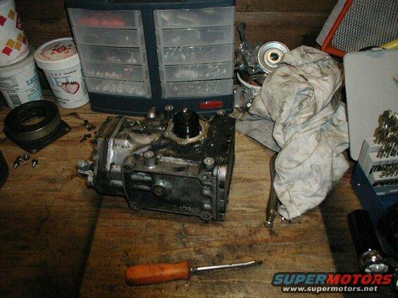Slide the seal retainer assembly off the shaft.