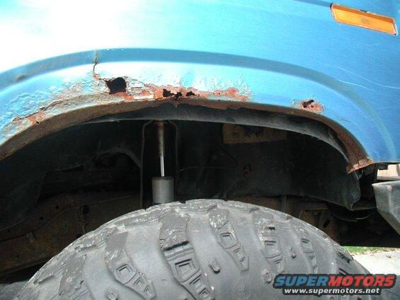 Because the fender lip is rotten, the whole inner fender is dropping.