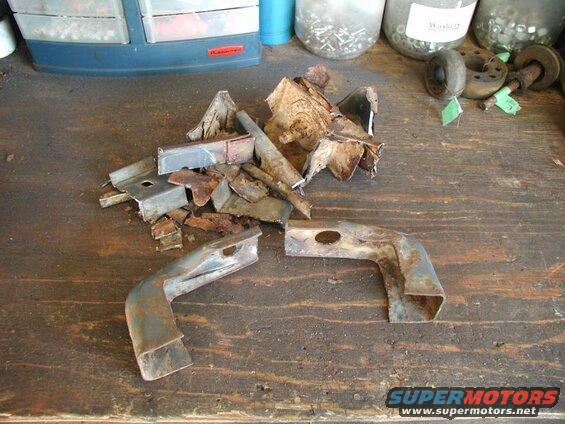 The old radiator mounts separated and ready for paint.