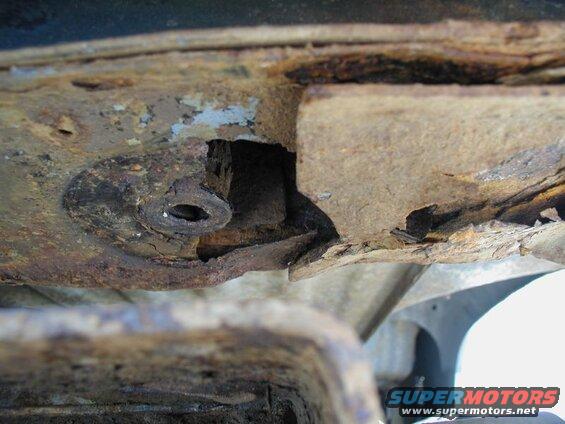 The right rear corner; extremely rotted.