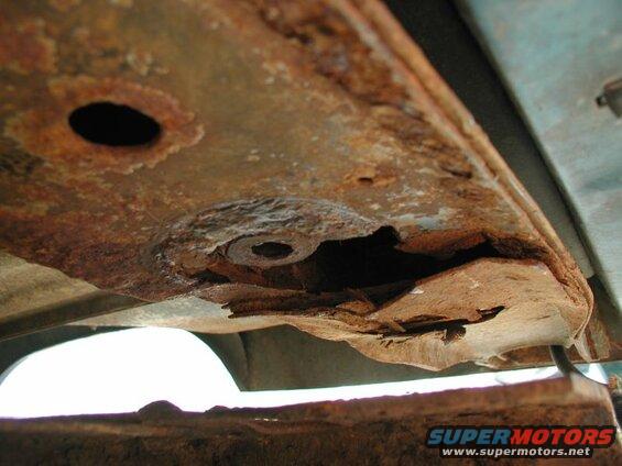 The right rear corner; extremely rotted.