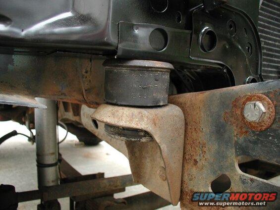 Rad support mounts in place. I had to trim down the shoulder a lot, as the factory hole was narrow and almost oval shaped.