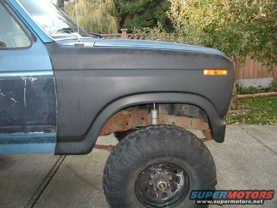 Front fender bolted into place.