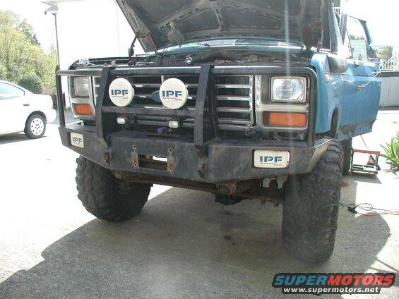 Got the front bumper back on. I wanted to throw some fresh paint on it while it was off, but I used up all my paint the other day on the rock sliders. I'll get some paint on the the bumper the next time I work on the Bronco.